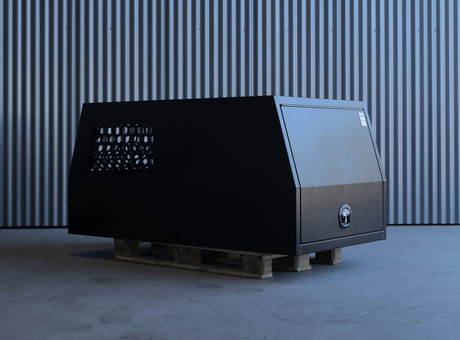 Front perspective of Apboxes 1000mm black 1-2 dog box canopy, ideal for safe dog transport.