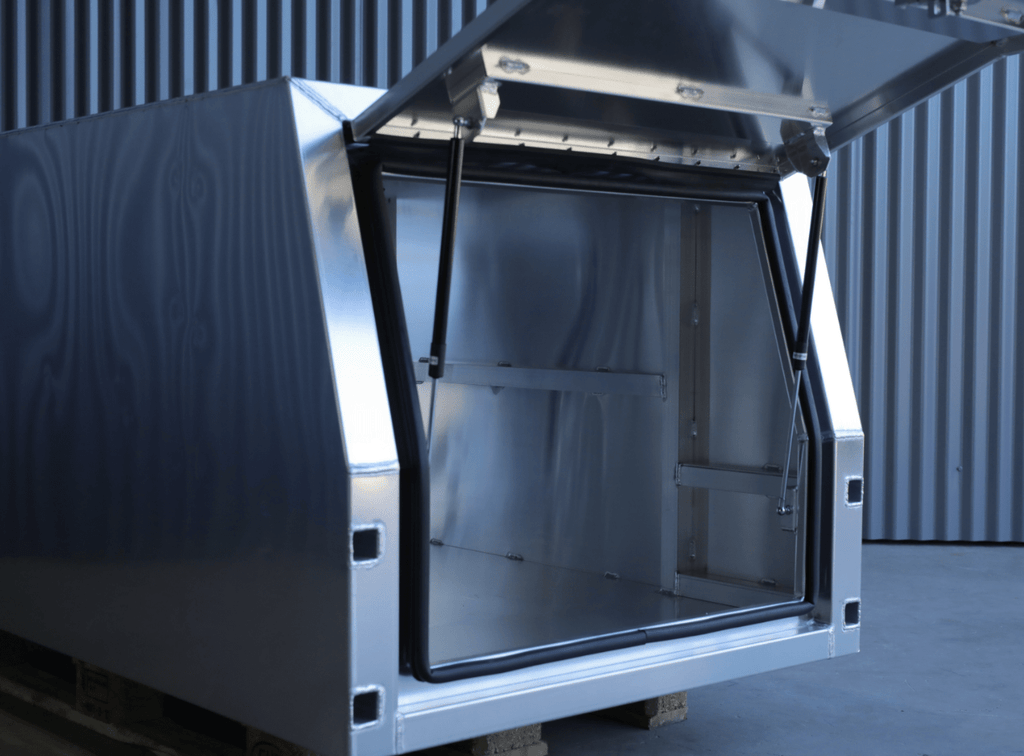 Angled shot of an apboxes 800mm aluminium gullwing canopy, designed for reliable and versatile storage.