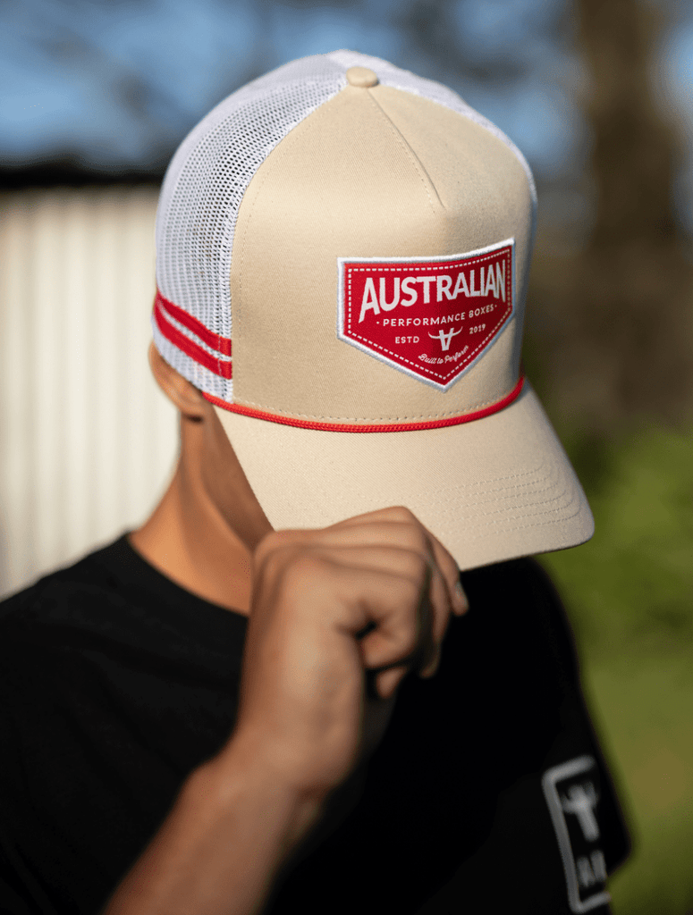 Man wearing the apboxes cream and white trucker hat