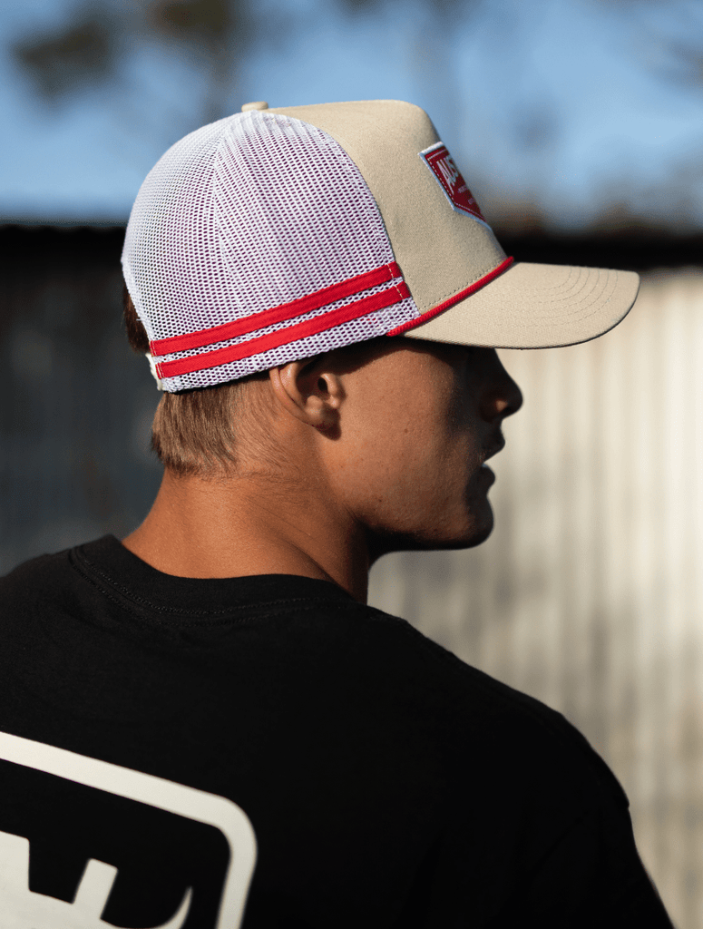 Man wearing the apboxes cream and white trucker hat