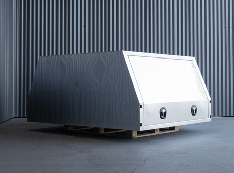 APBOXES XL Series 1600mm alloy jack-off canopy, side view, on warehouse floor